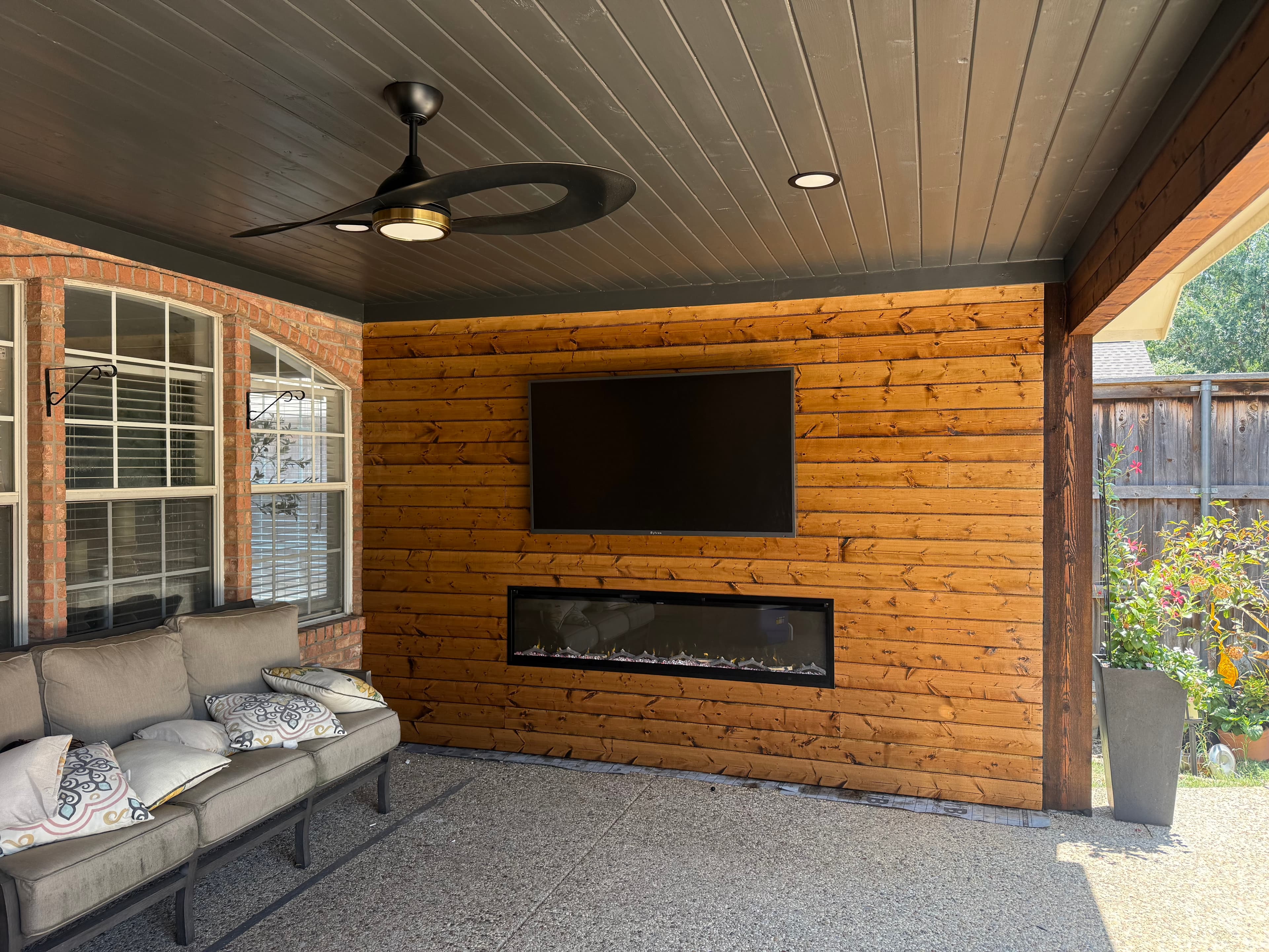 Fireplace and TV Patio Cover by Titan Built Outdoors